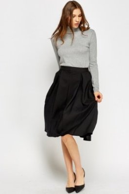 This flirty skirt will be perfect in the office - especially with seamed stockings.